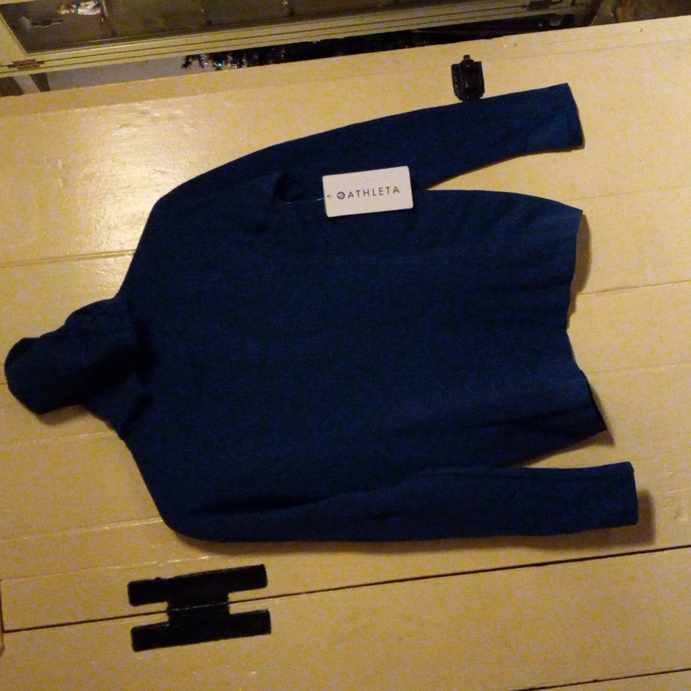 Athleta flurry seamless unstinkable.  size lg hooded power of she
